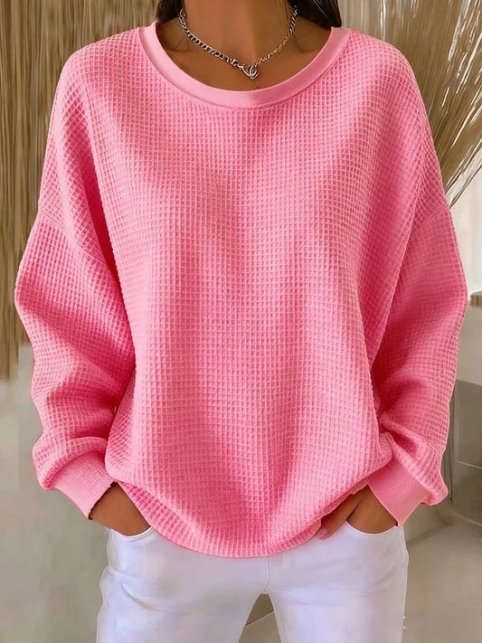 Sweater med rund hals og vaffelstruktur i løs pasform til damer