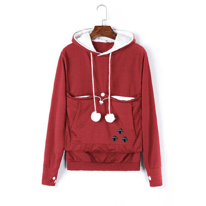 Hoodie til damer med kængurulomme og snørebånd med pomponer
