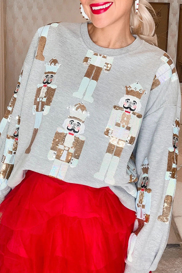 Julesweater dame med nøddeknækkere og pailletter, løs pasform