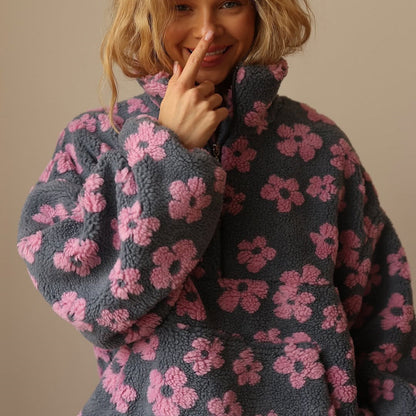 Hoodie til damer med halv lynlås og blomsterprint i oversized fit