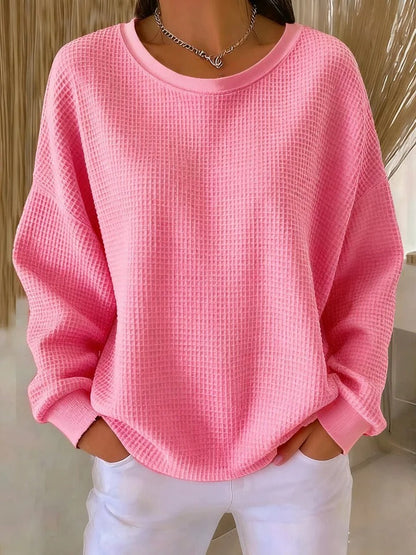 Sweater med rund hals og vaffelstruktur i løs pasform til damer