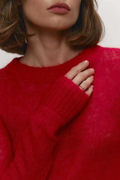 Gennemsigtig sweater med rund hals og lange ærmer til damer