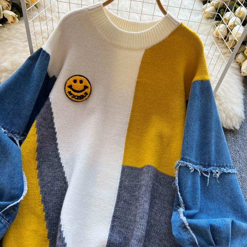 Sweater med ballonærmer af denim og rund hals til damer