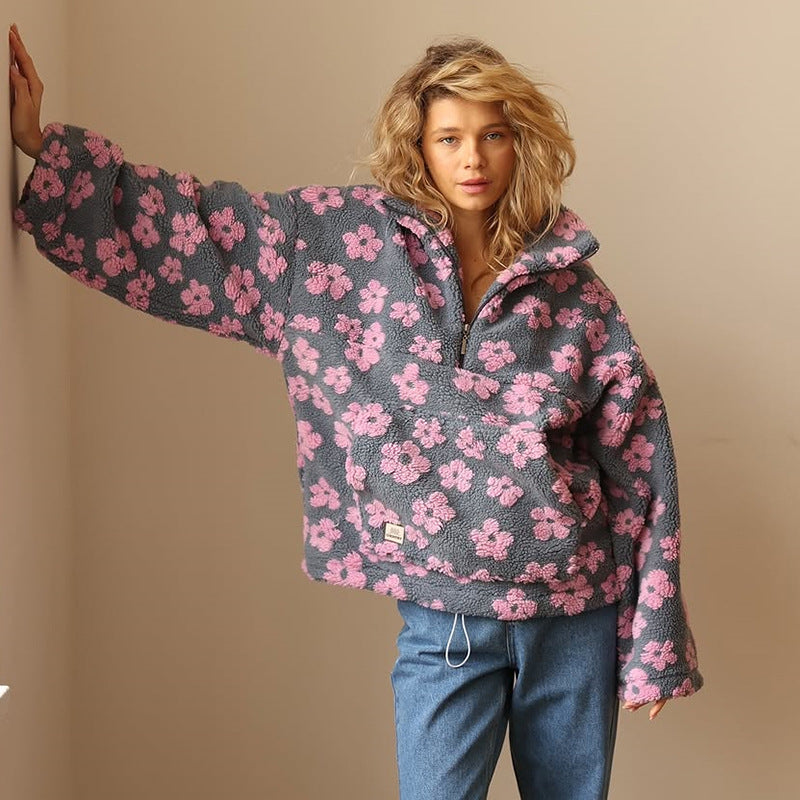 Hoodie til damer med halv lynlås og blomsterprint i oversized fit
