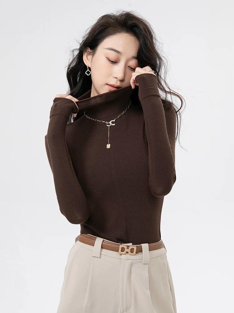 Ribstrikket sweater med rullekrave og varmt foer til damer