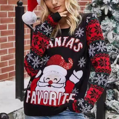 Julesweater dame med julemand i palietter og snefnugmønster på ærmerne