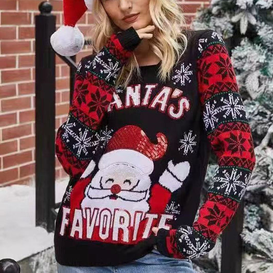 Julesweater dame med julemand i palietter og snefnugmønster på ærmerne