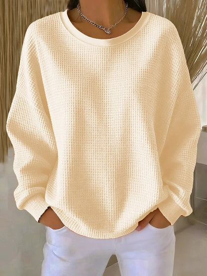 Sweater med rund hals og vaffelstruktur i løs pasform til damer