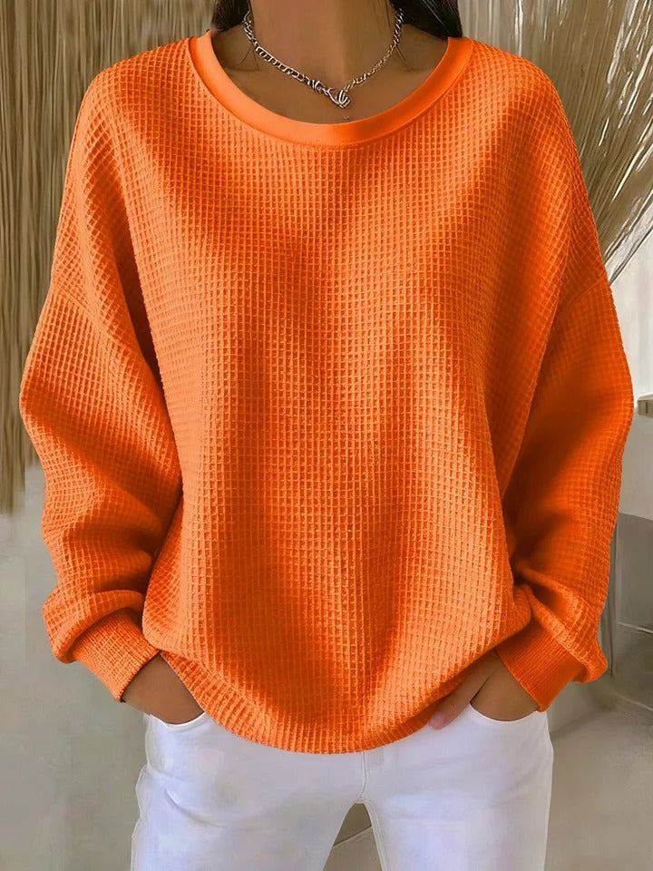 Sweater med rund hals og vaffelstruktur i løs pasform til damer