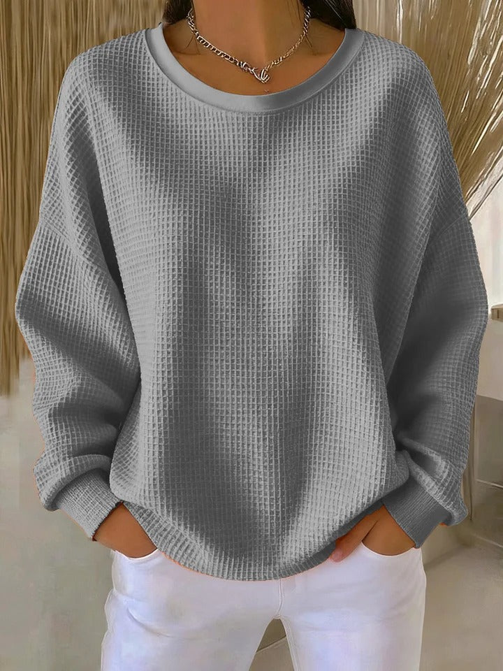 Sweater med rund hals og vaffelstruktur i løs pasform til damer