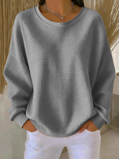Sweater med rund hals og vaffelstruktur i løs pasform til damer